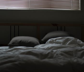 empty white and gray bed set