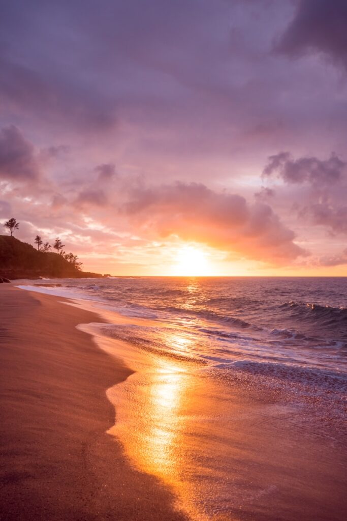 Peaceful beach sunset symbolizing calm and relief from summer anxiety.