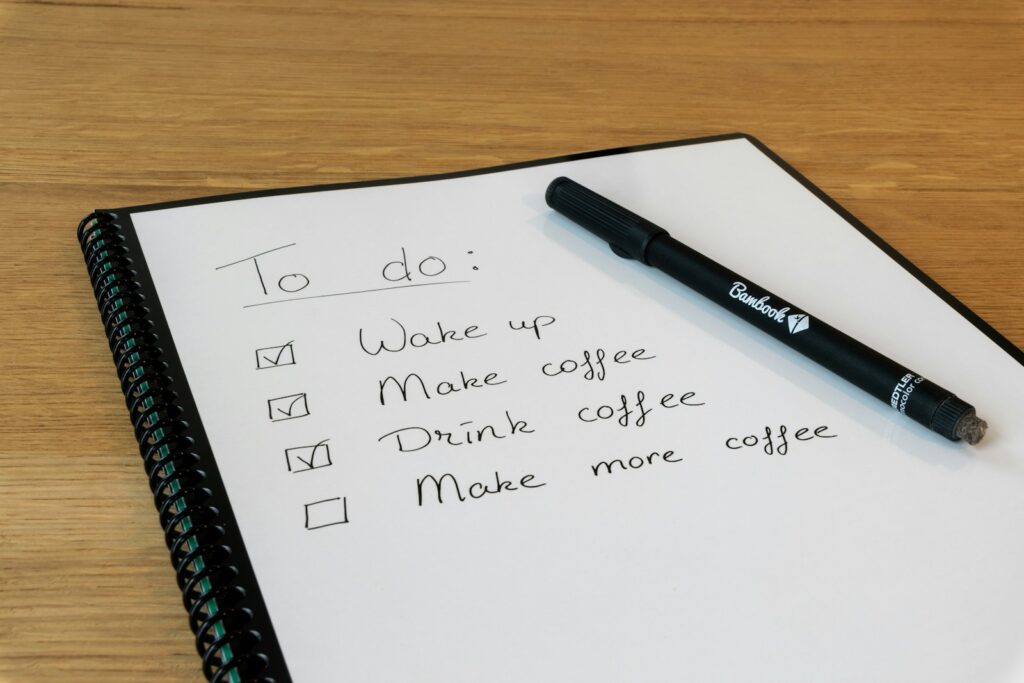 Minimal to-do list with just a few clear tasks written neatly on a page.